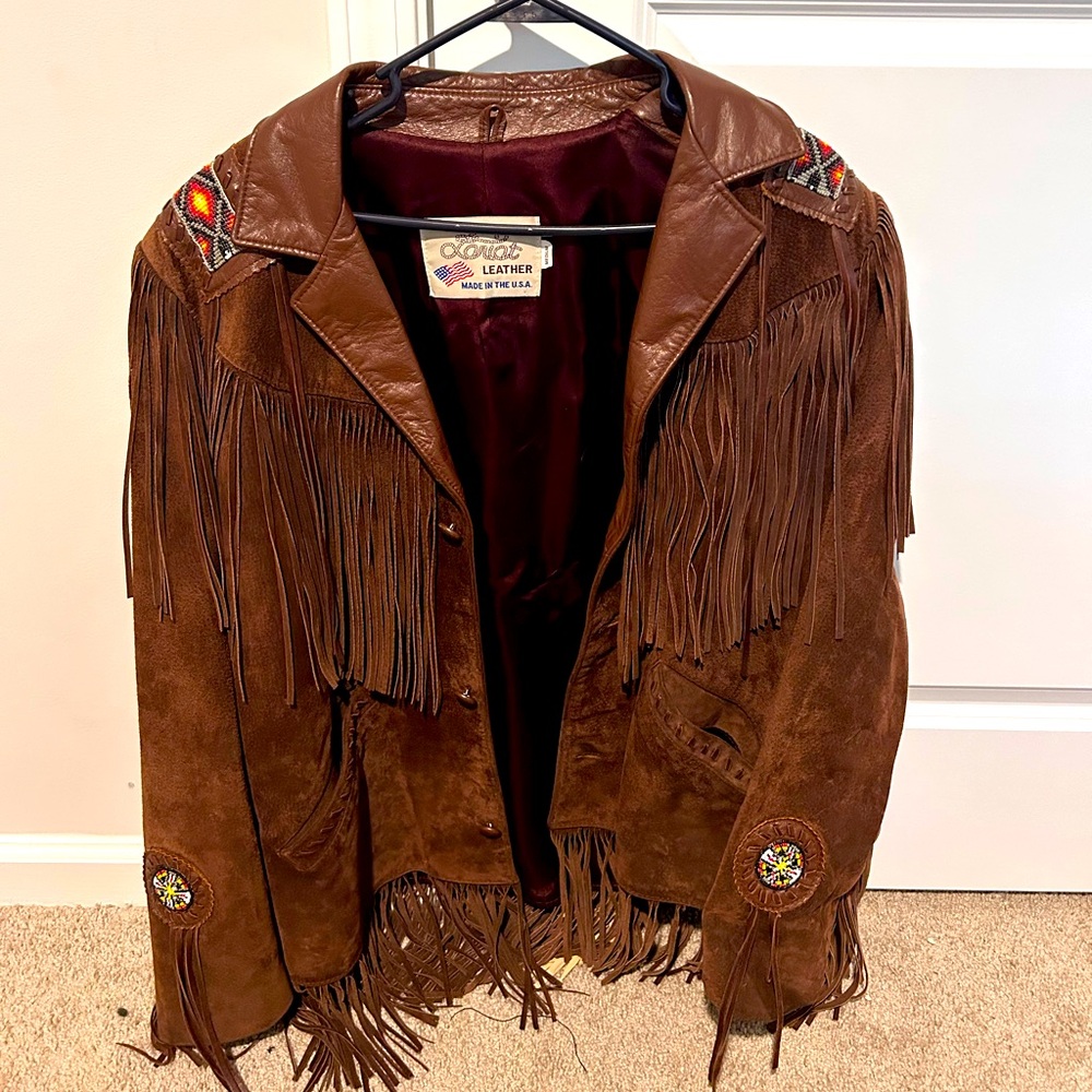 Lariat fringe leather brown jacket.